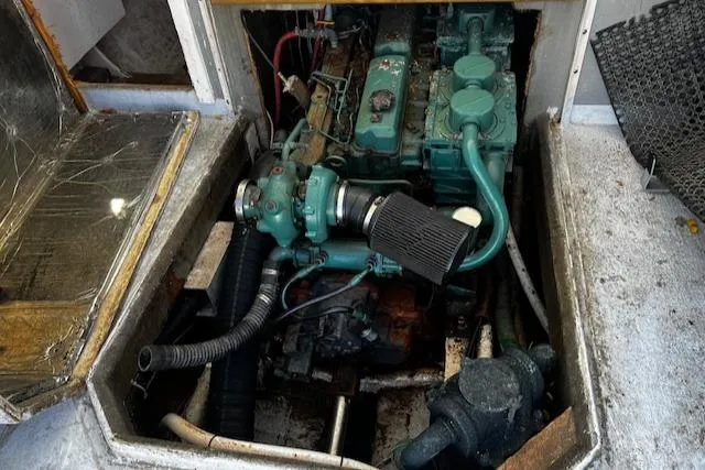 Slide: The Image of Engine compartment of a 1990 Downeast Beal Lobster Boat. - 13