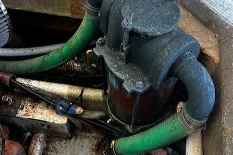 Slide: The Image of Engine compartment of a 1990 Downeast Beal Lobster Boat. - 14