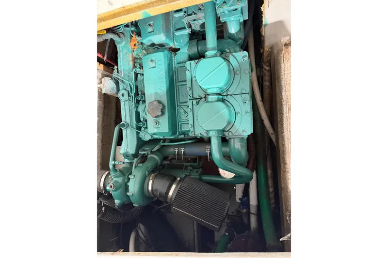 Slide: The Image of Engine of a 1990 BEALS Lobster Boat/Fishing Commercial, featuring a Volvo component. - 20