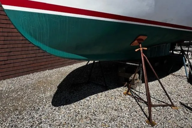 Slide: The Image of Underside of a 1990 Downeast Beal fishing boat on stands. - 25