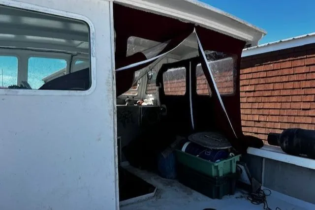Slide: The Image of Interior of a 1990 Downeast Beal Lobster Boat with equipment. - 5