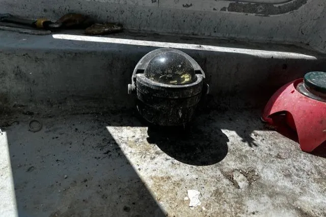 Slide: The Image of Compass on a 1990 Downeast Beal Lobster Boat. - 7