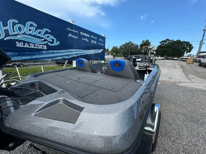 Slide: The Image of 2025 Ranger Z185 boat at Holida Marine dealership, featuring spacious deck and modern design. - 7