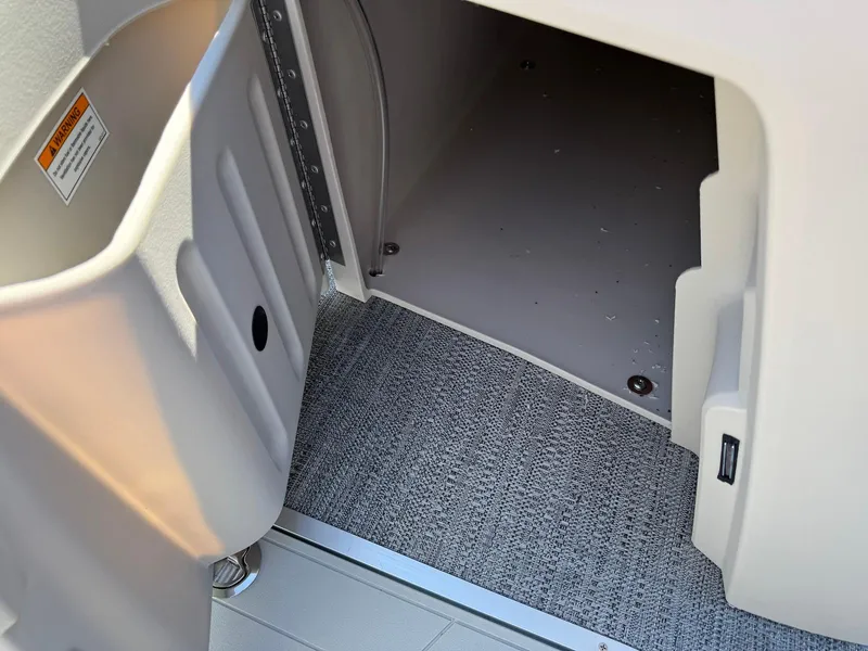 Slide: The Image of Interior storage compartment of 2025 Godfrey Sweetwater 2286 SFLC boat. - 17