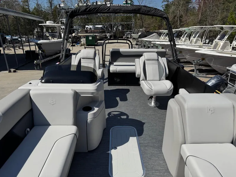 Slide: The Image of 2025 Godfrey Sweetwater 2286 SFLC pontoon boat with spacious seating and modern design. - 8