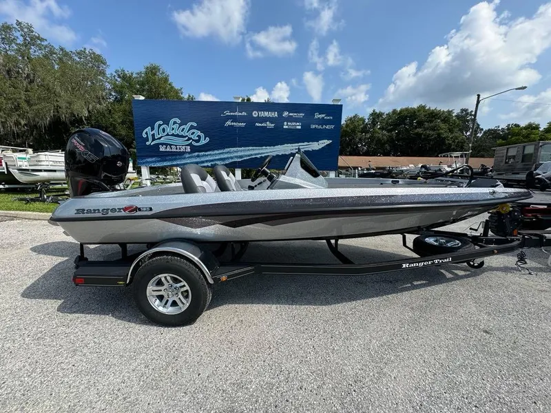 The Image of 2025 Ranger Z185 boat on trailer, displayed outdoors under a clear sky. - 0
