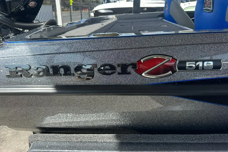 Slide: The Image of 2025 Ranger Z185 boat with metallic finish and Z518 emblem. - 102