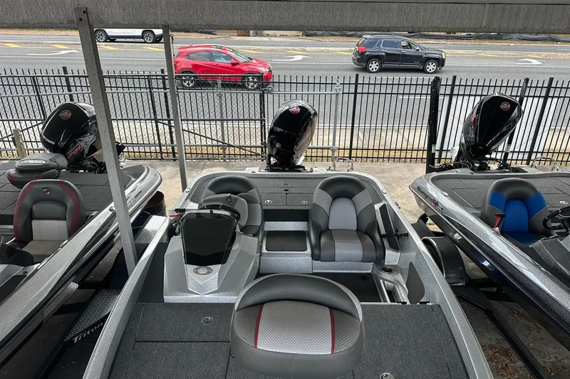 Slide: The Image of 2025 Ranger Z185 boats displayed in a showroom, featuring sleek design and modern seating. - 109