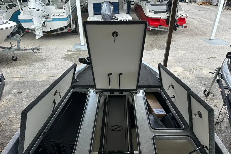 Slide: The Image of 2025 Ranger Z185 boat storage compartments open, showcasing spacious interior design. - 110