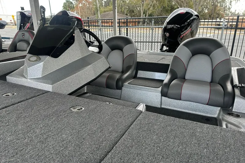 Slide: The Image of 2025 Ranger Z185 boat interior with dual seats and steering console. - 112