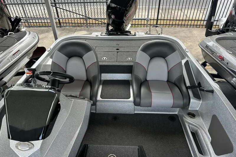 Slide: The Image of 2025 Ranger Z185 boat interior with dual seats and steering console. - 113