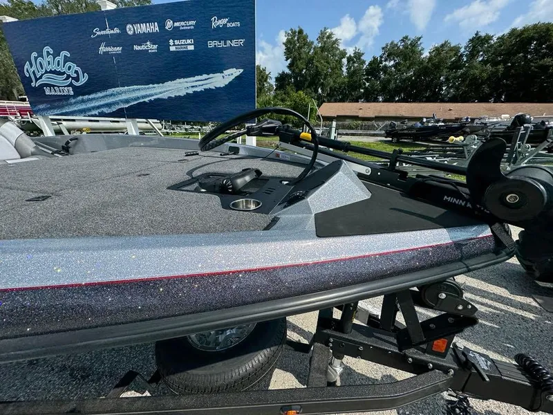 Slide: The Image of 2025 Ranger Z185 boat on trailer, featuring a sleek design and modern equipment. - 2