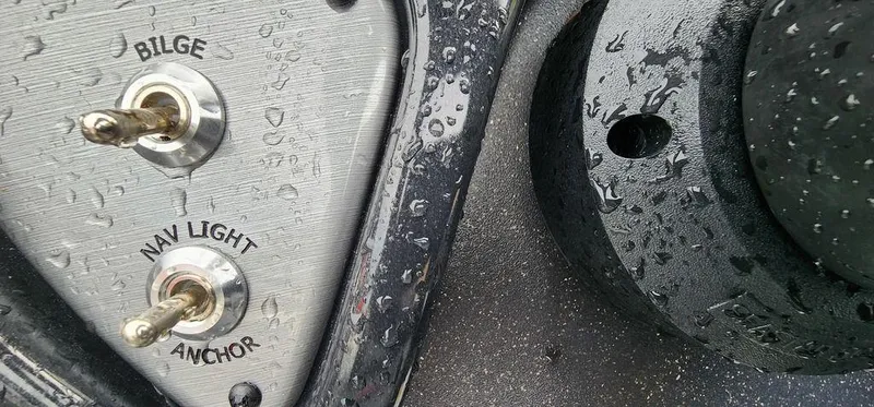 Slide: The Image of Control panel of 2024 Tracker Pro Team 175 TF boat with bilge and nav light switches. - 15