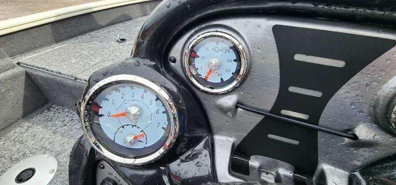Slide: The Image of Dashboard of 2024 Tracker Pro Team 175 TF boat with gauges and controls. - 16