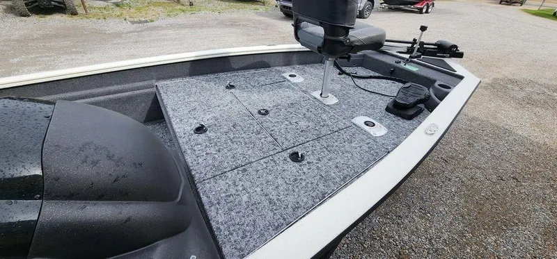 Slide: The Image of 2024 Tracker Pro Team 175 TF boat deck with motor and controls. - 19