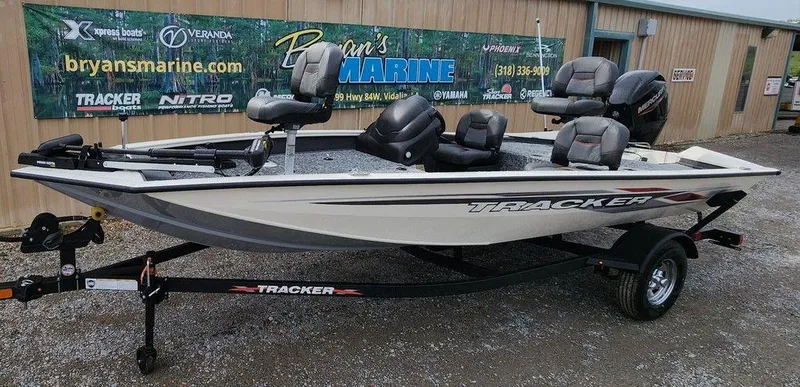Slide: The Image of 2024 Tracker Pro Team 175 TF fishing boat on trailer, displayed outside Bryan's Marine. - 3