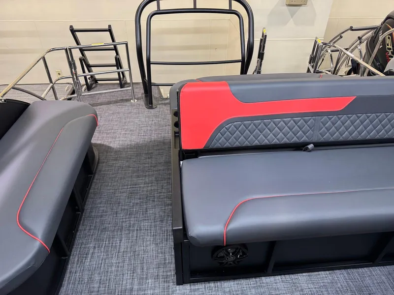 Slide: The Image of 2025 Godfrey Sweetwater 2286 SFLC boat interior with gray and red seating. - 10