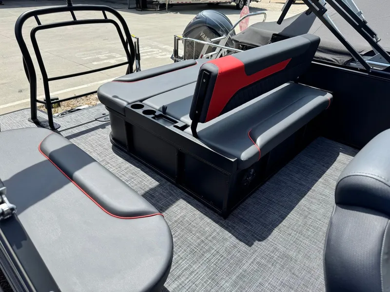 Slide: The Image of 2025 Godfrey Sweetwater 2286 SFLC boat interior with sleek seating and modern design. - 17