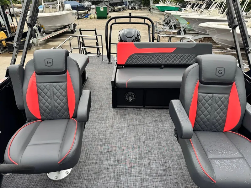Slide: The Image of 2025 Godfrey Sweetwater 2286 SFLC pontoon boat interior with stylish seating and modern design. - 22