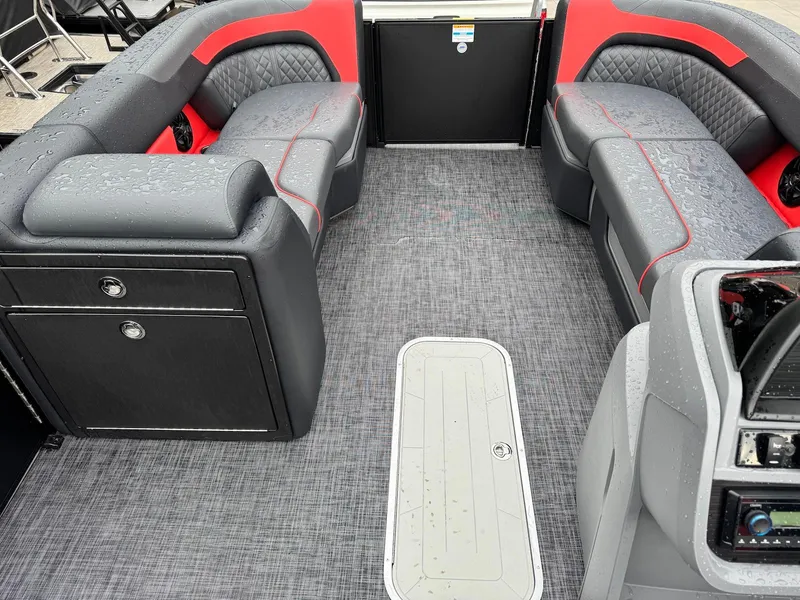 Slide: The Image of Interior of 2025 Godfrey Sweetwater 2286 SFLC pontoon boat with gray and red seating. - 23