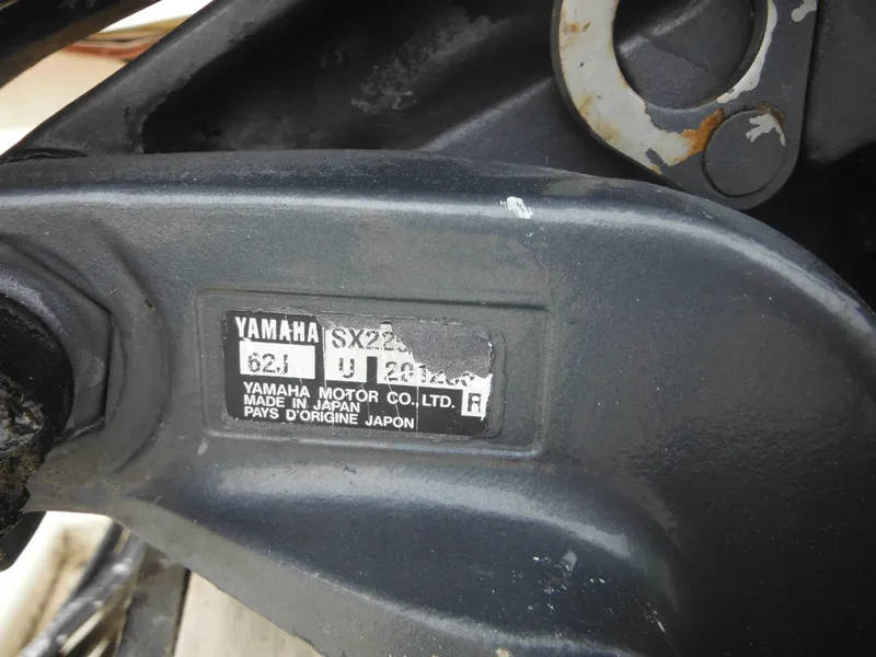 Slide: The Image of Yamaha motor part with label on a 2002 Parker 2520 Modified Vee Sport Cabin. - 14