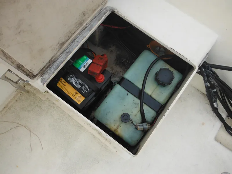 Slide: The Image of Battery and tank compartment in a 2002 Parker 2520 Modified Vee Sport Cabin boat. - 20