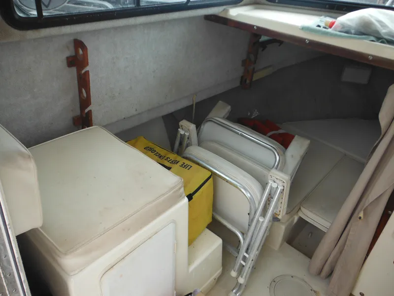 Slide: The Image of Interior of 2002 Parker 2520 Modified Vee Sport Cabin with seating and storage. - 29