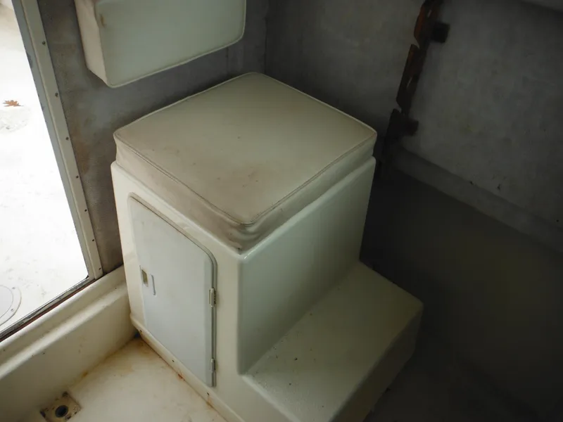 Slide: The Image of 2002 Parker 2520 Modified Vee Sport Cabin interior seating and storage area. - 38