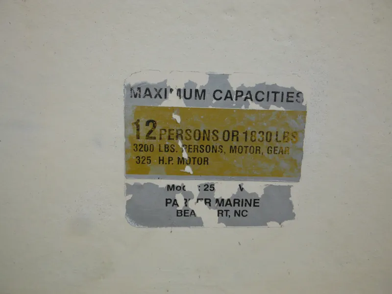 Slide: The Image of Capacity label on 2002 Parker 2520 Modified Vee Sport Cabin, 12 persons or 1830 lbs. - 45