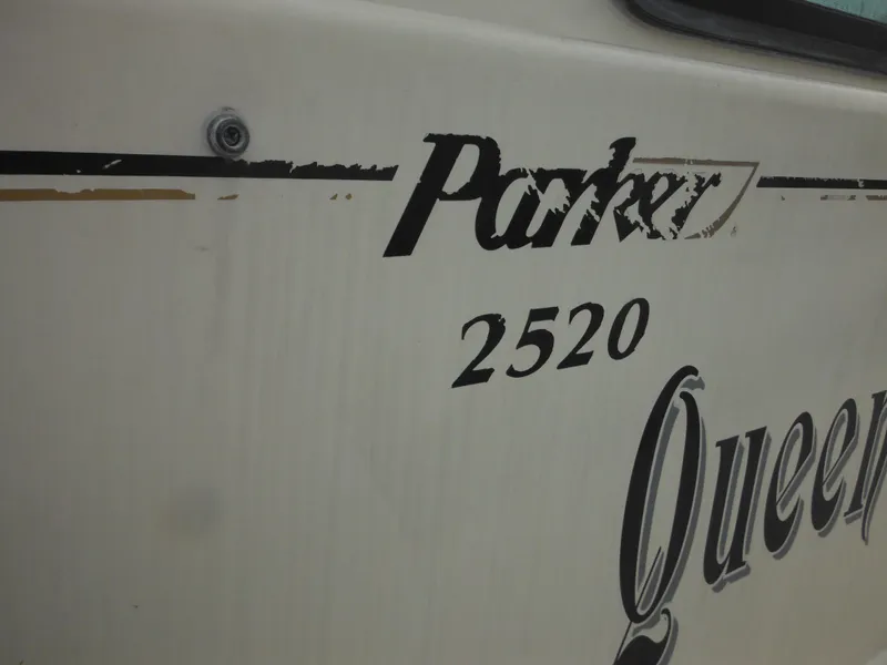 Slide: The Image of Side view of a 2002 Parker 2520 Modified Vee Sport Cabin boat. - 47
