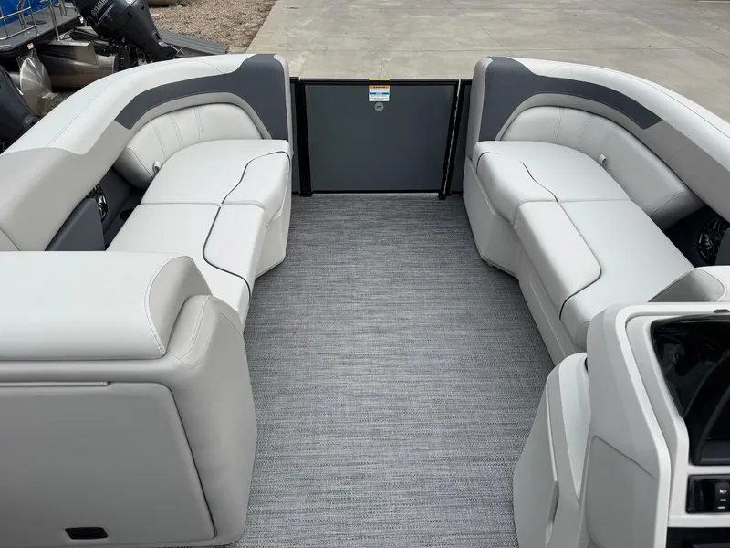 Slide: The Image of 2025 Godfrey Sweetwater 2086 SB pontoon boat interior with gray seating and flooring. - 10