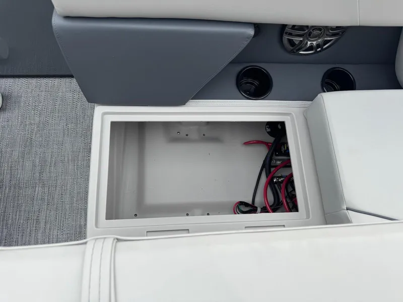 Slide: The Image of Open storage compartment in 2025 Godfrey Sweetwater 2086 SB boat interior. - 23