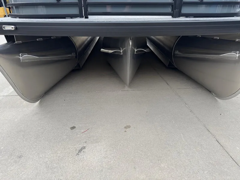 Slide: The Image of 2025 Godfrey Sweetwater 2086 SB pontoon boat underside view, showcasing triple pontoon design. - 30