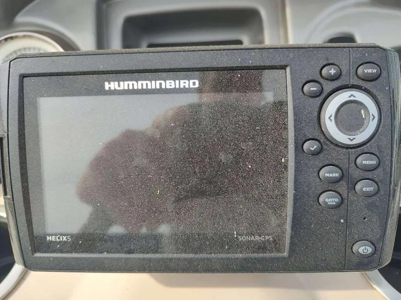 Slide: The Image of Humminbird Helix 5 fish finder on 2016 Sun Tracker Fishin' Barge 22 DLX dashboard. - 16