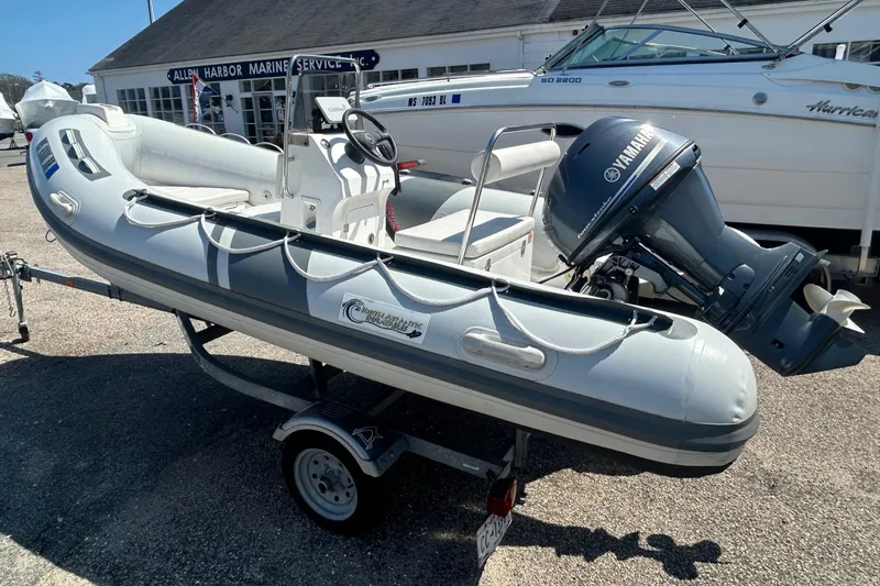 Slide: The Image of 2021 North Atlantic Inflatables RIB420 boat with Yamaha motor on trailer. - 5