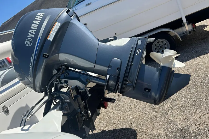 Slide: The Image of 2021 North Atlantic Inflatables RIB420 with Yamaha outboard motor, parked on a trailer. - 9