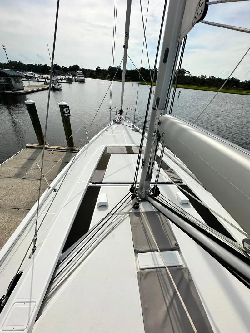 Slide: The Image of Beneteau Oceanis 46.1 sailboat docked at marina, 2022 model, view from deck. - 7