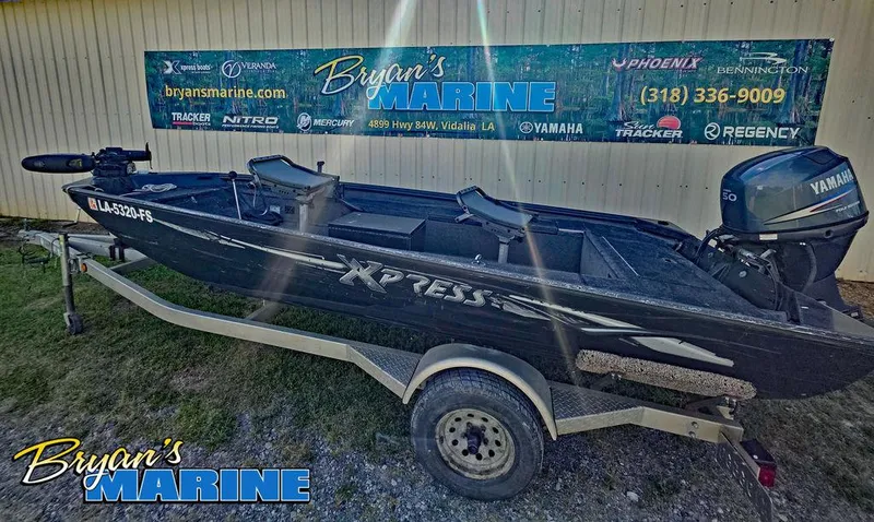 Slide: The Image of 2008 Xpress XP16PF Stick-Steer boat on trailer at Bryan's Marine dealership. - 1