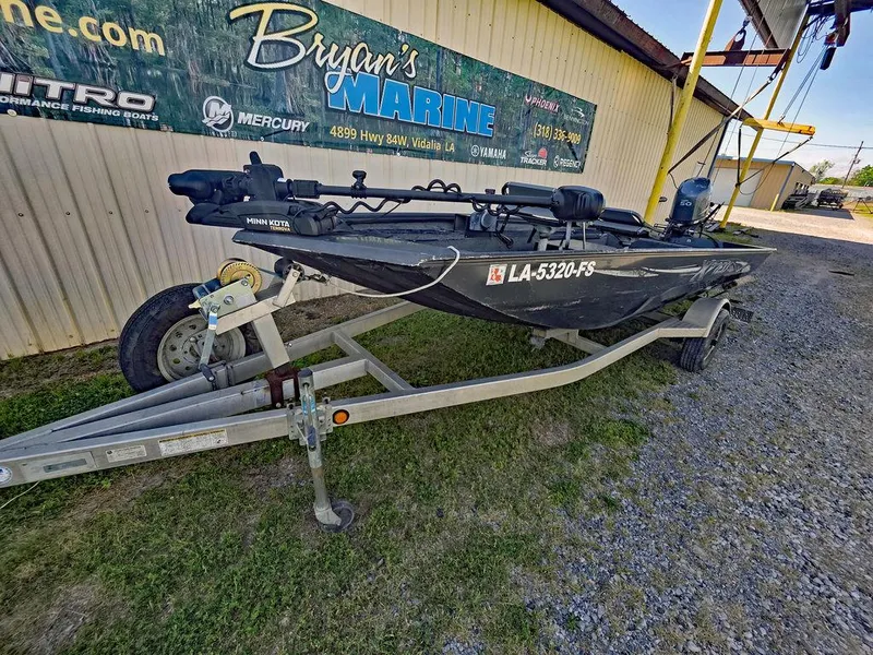 Slide: The Image of 2008 Xpress XP16PF Stick-Steer boat on trailer at Bryan's Marine dealership. - 2
