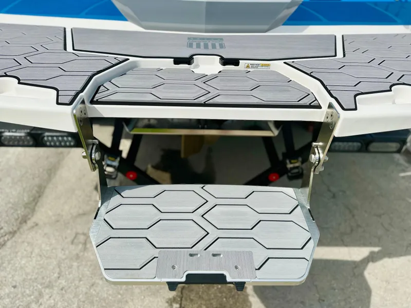 Slide: The Image of 2023 MasterCraft NXT21 swim platform with hexagonal pattern design. - 5