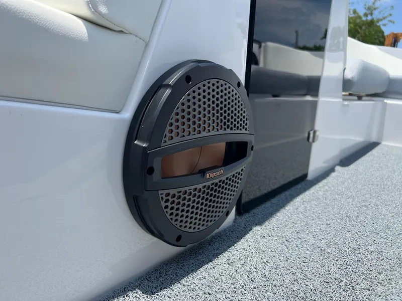 Slide: The Image of 2023 MasterCraft NXT23 boat interior with Kicker speaker detail. - 5