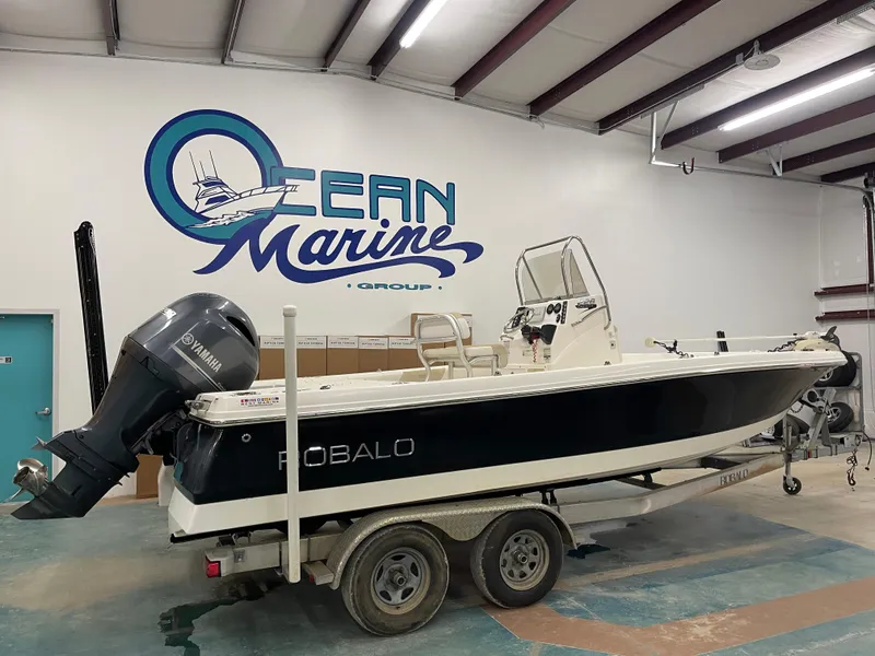 Slide: The Image of 2015 Robalo 226 Cayman boat on trailer in Ocean Marine Group facility. - 5