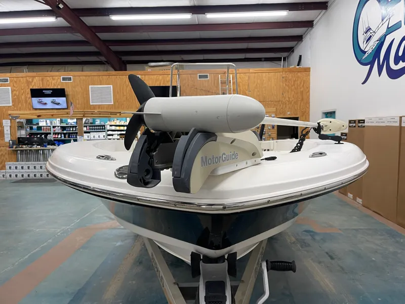 Slide: The Image of 2015 Robalo 226 Cayman boat with MotorGuide trolling motor in showroom. - 6