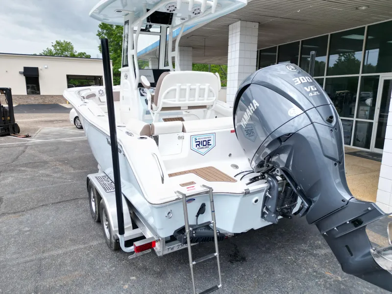 Slide: The Image of 2025 Tidewater 232LXF boat with Yamaha 300 V6 engine on trailer. - 15