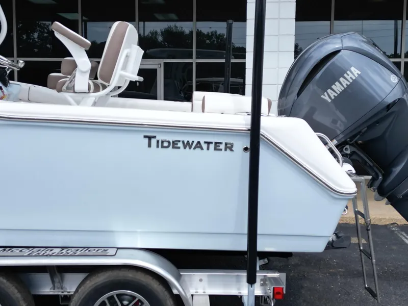 Slide: The Image of 2025 Tidewater 232LXF boat with Yamaha engine on trailer. - 25
