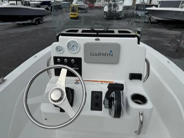 Slide: The Image of 2020 Wellcraft 162 Fisherman boat console with Garmin navigation system and steering wheel. - 6