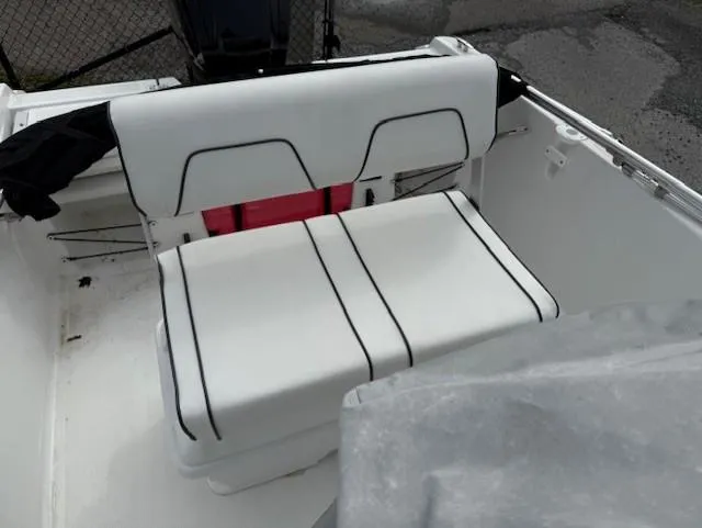 Slide: The Image of 2020 Wellcraft 162 Fisherman boat seat with white upholstery and black trim. - 7