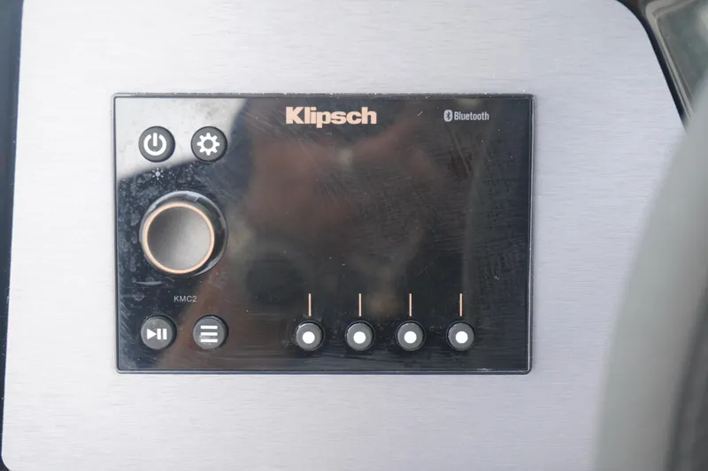 Slide: The Image of Control panel of a Klipsch audio system with Bluetooth in a 2023 MasterCraft NXT24 boat. - 11