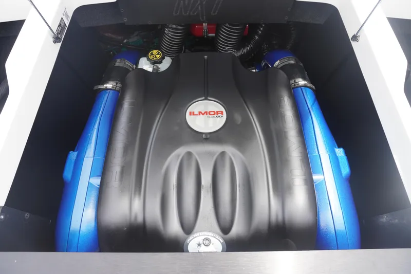 Slide: The Image of 2023 MasterCraft NXT24 engine featuring Ilmor branding, showcasing powerful performance components. - 28