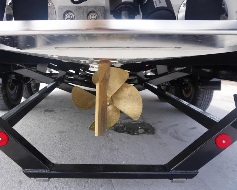 Slide: The Image of 2023 MasterCraft NXT24 interior with speaker and carpeted flooring. - 5